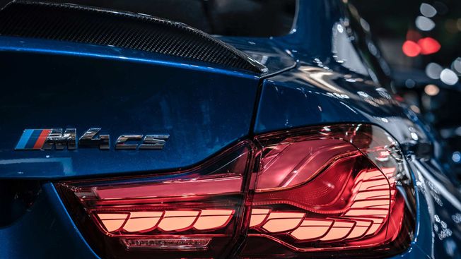 A BMW M4CS with a carbon spoiler added